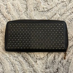Black wallet with gold studs